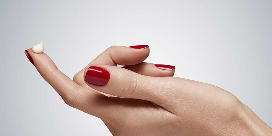 Women keeping Abreva cream at her finger